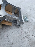 2 INCH CARB SPACER NEW IN BOX WITH STUDS ALUMINUM