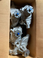 New genuine Chevrolet aluminum reverse rotation SBC water pumps. 1 reg