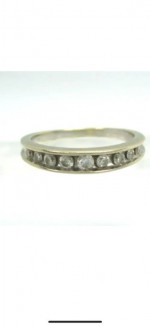 Men’s or women’s Zales .50 ctw diamond wedding band.