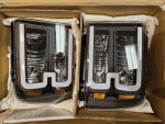 NIB 2005-2007 Ford F250 black headlights