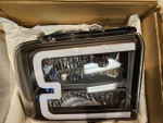 NIB 2005-2007 Ford F250 black headlights