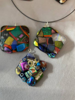 Fused glass pendant on black wire necklace