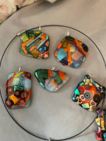 Fused glass pendant on black wire necklace
