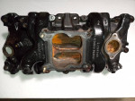 Stock Chevy small block high rise cast iron 4 barrel intake