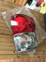 Toyota Tundra tail light, new in box