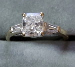 1.01ct Radiant naturalDiamond, E, VVS1 with 2 baguette accent diamonds