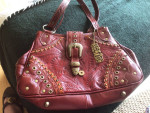 Brand new “American West” real leather hand tooled bag