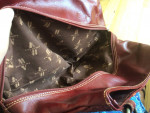 Brand new “American West” real leather hand tooled bag