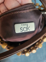 The Sak wood beaded purse