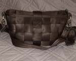 Harvey's twist clasp seatbelt hobo bag