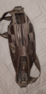 Harvey's twist clasp seatbelt hobo bag