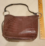 Brown Puntotres leather handbag