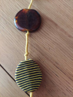 36" Vintage large Brown / yellow beads necklace. Plastic /cotton beads