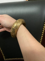 Antique chiseled brass bangle bracelet
