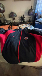 Ladies: NIKE “Lady Rebel’s Baskekball Team Jacket Red/Black Large Jacke