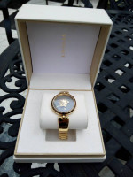 Versace Women's Watch with Gold-Tone Bracelet