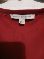 Nice rust orange color top tie at waist