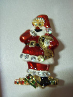 Christopher Radko presents Shiny Brite Christmas Brooch pin.