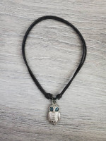 Owl necklace on a leather cord