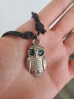 Owl necklace on a leather cord