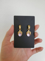 Gold-tone earrings with pink stones