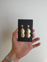 Gold-tone dangling leaf earrings