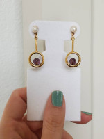 Dangle earrings with purple bead