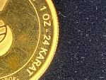 Troy ounce if pure gold