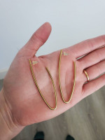 Gold-tone elongated open hoop earrings