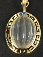 Gold chain and charm