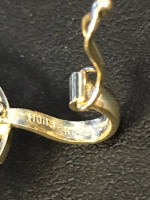 Gold chain and charm