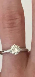 Women’s designer Love Story diamond solitaire engagement ring. 14K