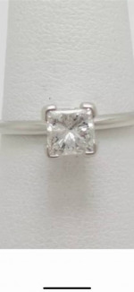 Platinum .88 carat princess diamond engagement ring.
