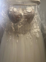 Never worn wedding dress