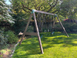 Custom built, pressure treated solid wood 3-swing swing set