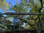 Custom built, pressure treated solid wood 3-swing swing set