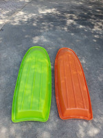 2 snow sleds
