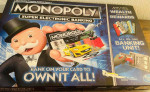 Hasbro Gaming Monopoly Super Electronic Banking Board Game, Electronic