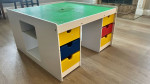 Lego table with 2 boxes of Legos and 2 chairs