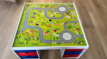 Lego table with 2 boxes of Legos and 2 chairs