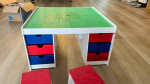Lego table with 2 boxes of Legos and 2 chairs