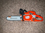 Kids Husqvarna 550xp chain saw battery operated
