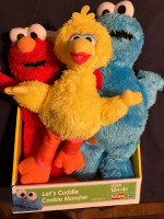 Sesame Street Cookie Monster, Big Bird and Elmo plush toys