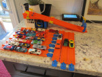 Hot Wheels two lane track, ten extra track and 25 cars