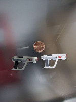 Pair of futuristic laser pistol side arms for action figures