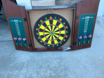 Dartboard and cabinet