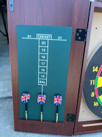 Dartboard and cabinet