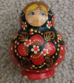 Russian Doll, 5 nested pcs, features gold-leaf paint and is elaborate