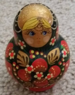 Russian Doll, 5 nested pcs, features gold-leaf paint and is elaborate