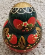 Russian Doll, 5 nested pcs, features gold-leaf paint and is elaborate